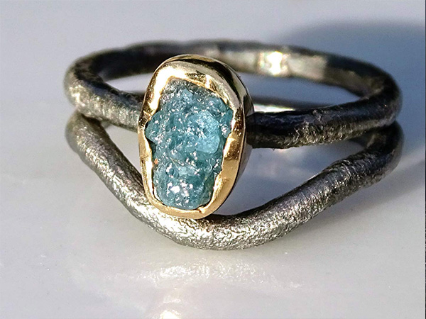 raw blue diamond viking bezel setting engagement ring