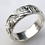 sculptural silver mens viking wedding band min